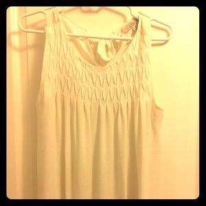 White sleeveless blouse from Loft. Tie in back.